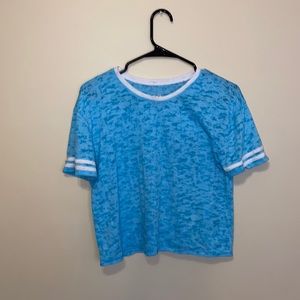 Size 14 in kids.  Blue justice t shirt